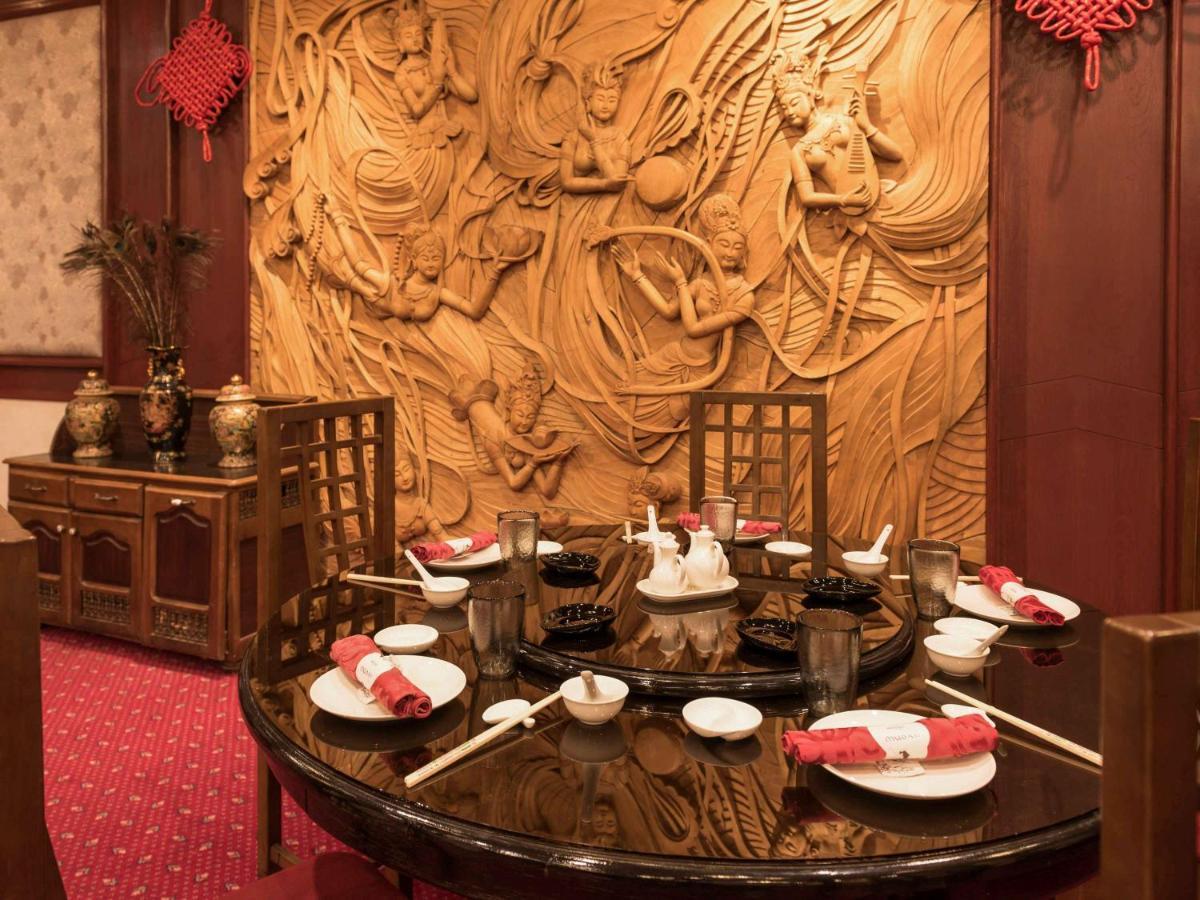 Dar el Beïda Hotel Mercure Alger Aeroport מראה חיצוני תמונה A table set for dim sum